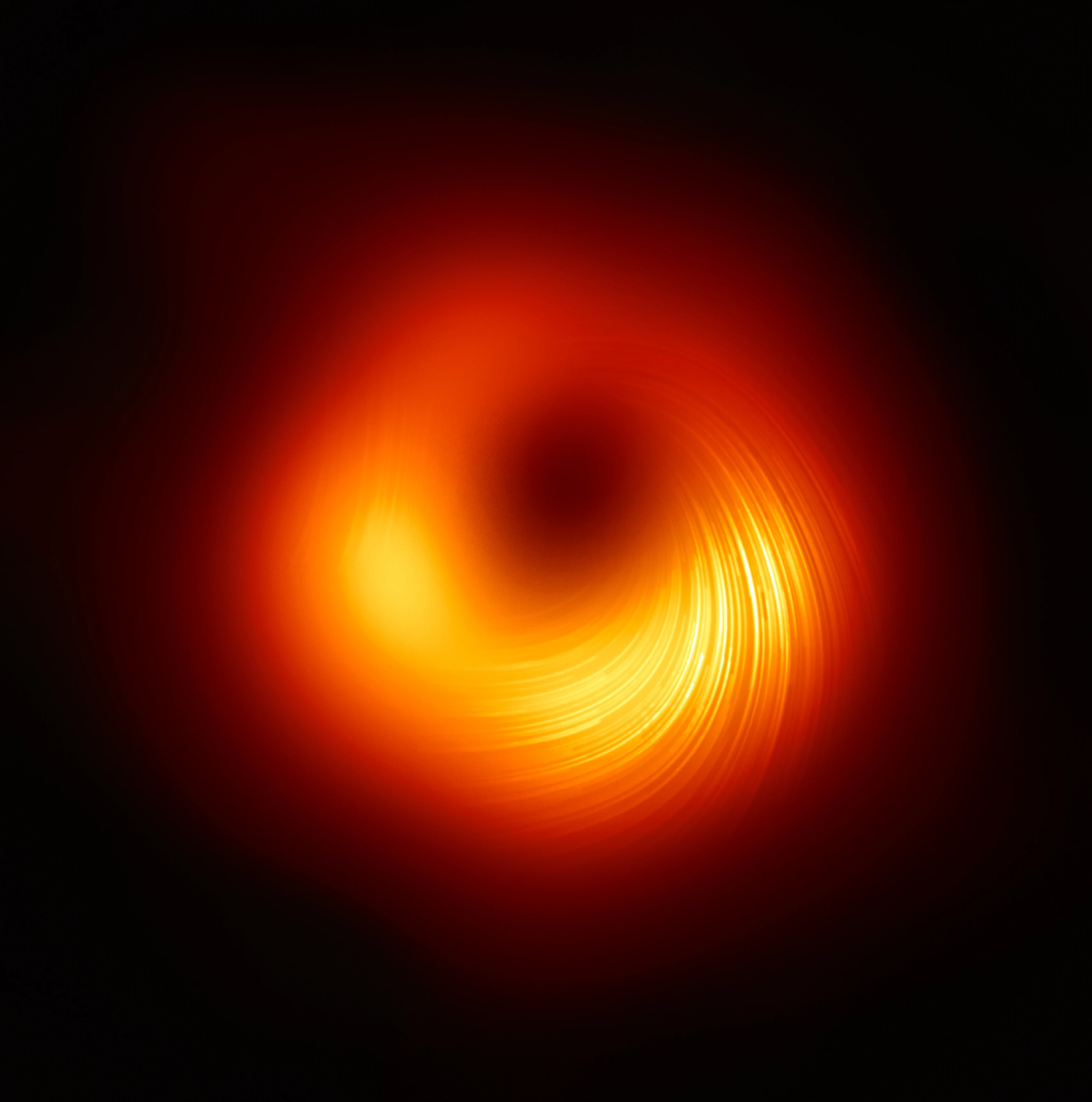 인류가 최초로 촬영한 블랙홀(M87*, 2019). 사건지평선망원경(EHT)이 블랙홀의 그림자를 관측했다. © EHT Collaboration